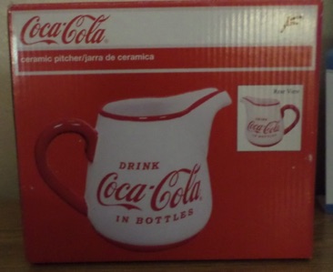 7437-1 € 22,50 coca cola aardewerk schenkkan.jpeg